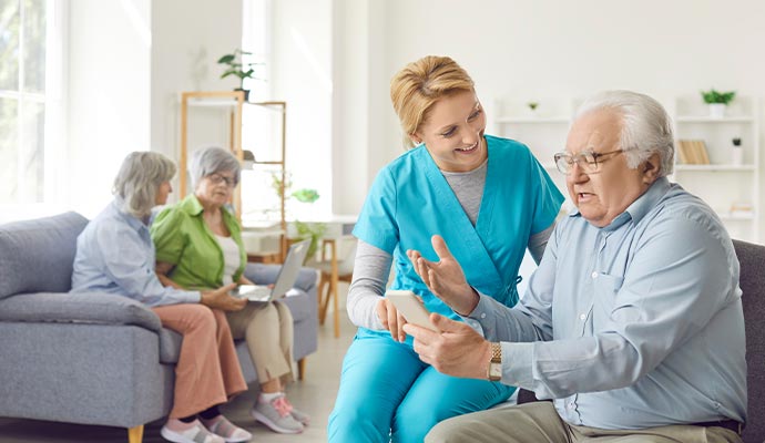 Doctor helping senior citizen