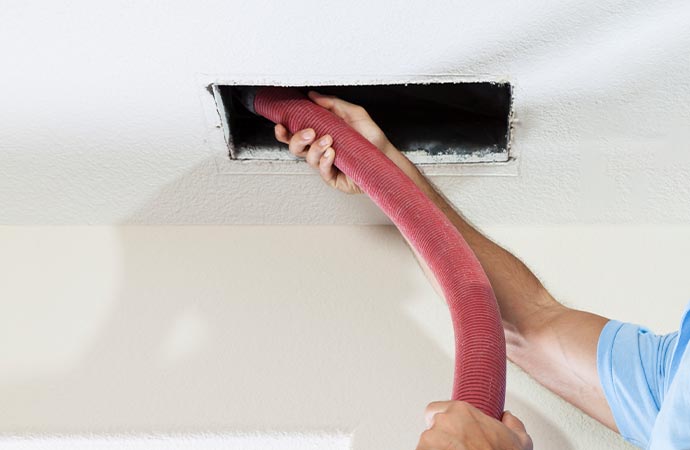 Professional worker removing smoke from the duck
