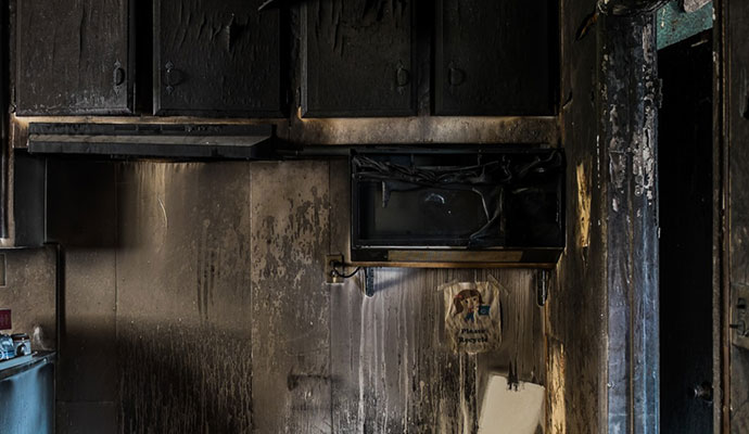 Smoke and soot damage in kitchen