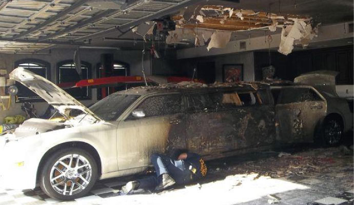 Professional expert restoring a fire damaged garage